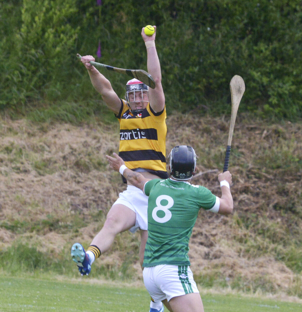 Na Piarsaigh's Kevin Moynihan grabs the sliotar above Ballincollig's James Dwyer. Picture: Denis Boyle