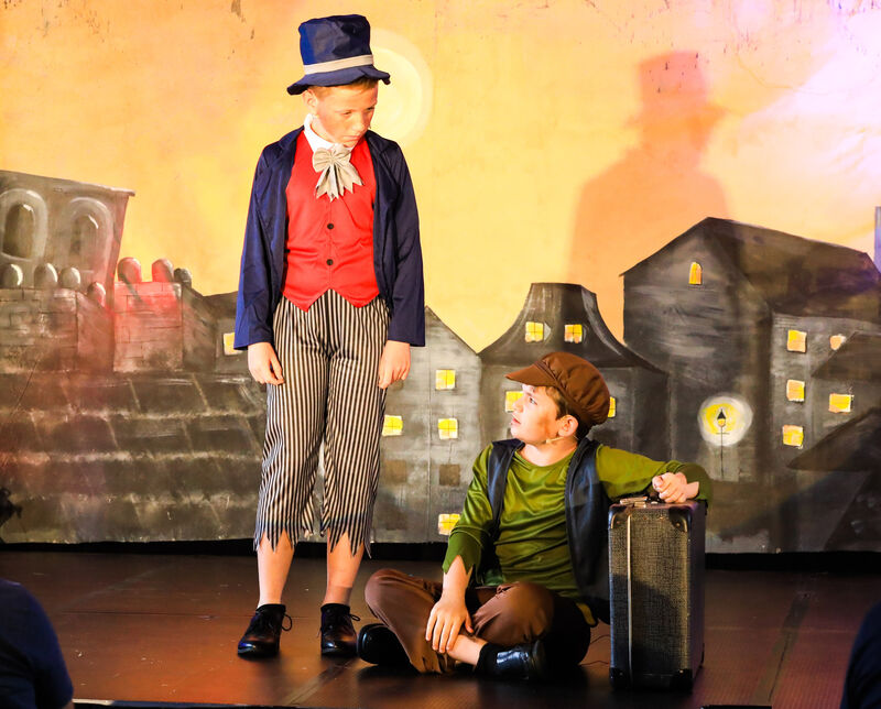   The Artful Dodger played by Conor Sheehan meets Oliver played by Jamie Walsh for the first time in the Togher National Boys School's production of Oliver Picture: David Creedon. 