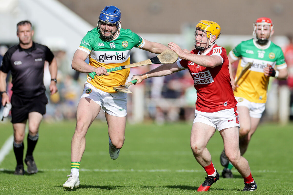 Cork's Niall O'Leary battles with Jack Clancy of Offaly. Picture: Inpho/Laszlo Geczo