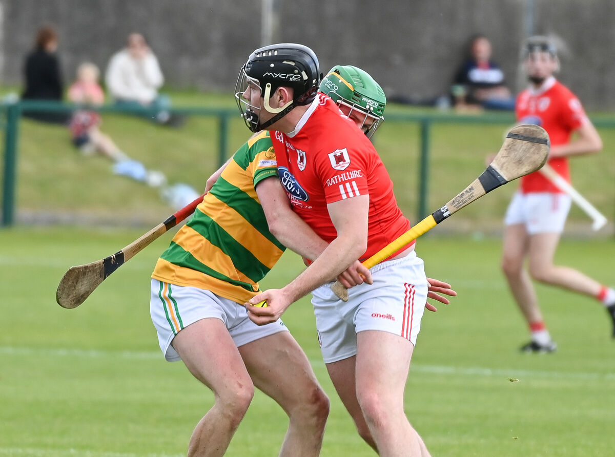  Charleville's Conor Buckley is tackled by Blackrock's David O'Farrell, during their SHL clash at Church Road.