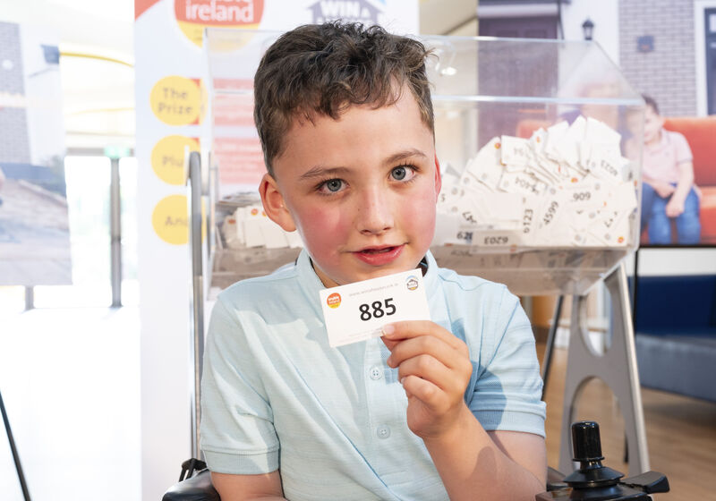 Adam Clarke, Newcestown, with the winning ticket at Enable Ireland’s Lavanagh Centre. Picture: Gerard McCarthy.
