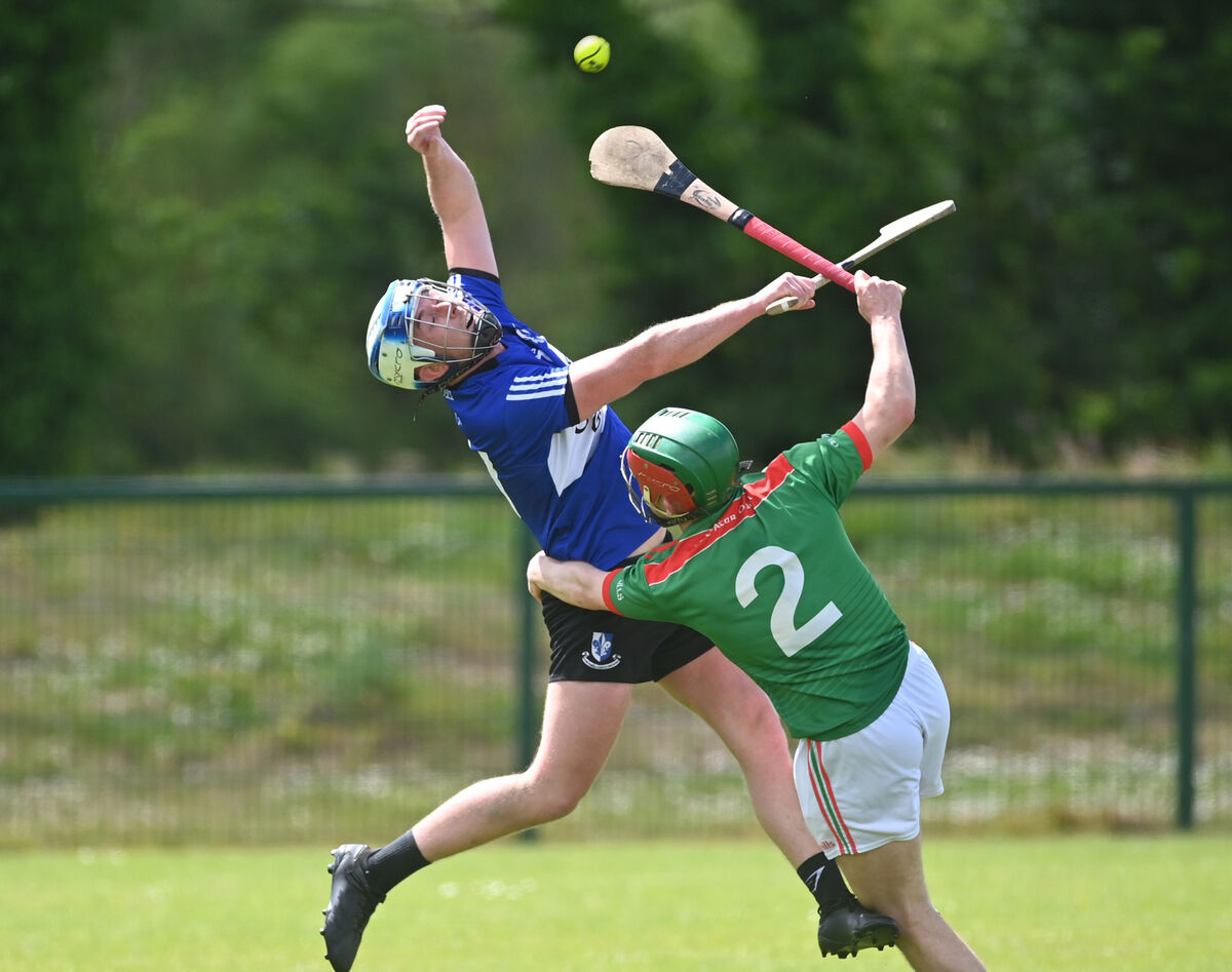 Sarsfields' Liam Healy and Fr O'Neill's Mikie Millerick under the dropping ball. Picture: Eddie O'Hare