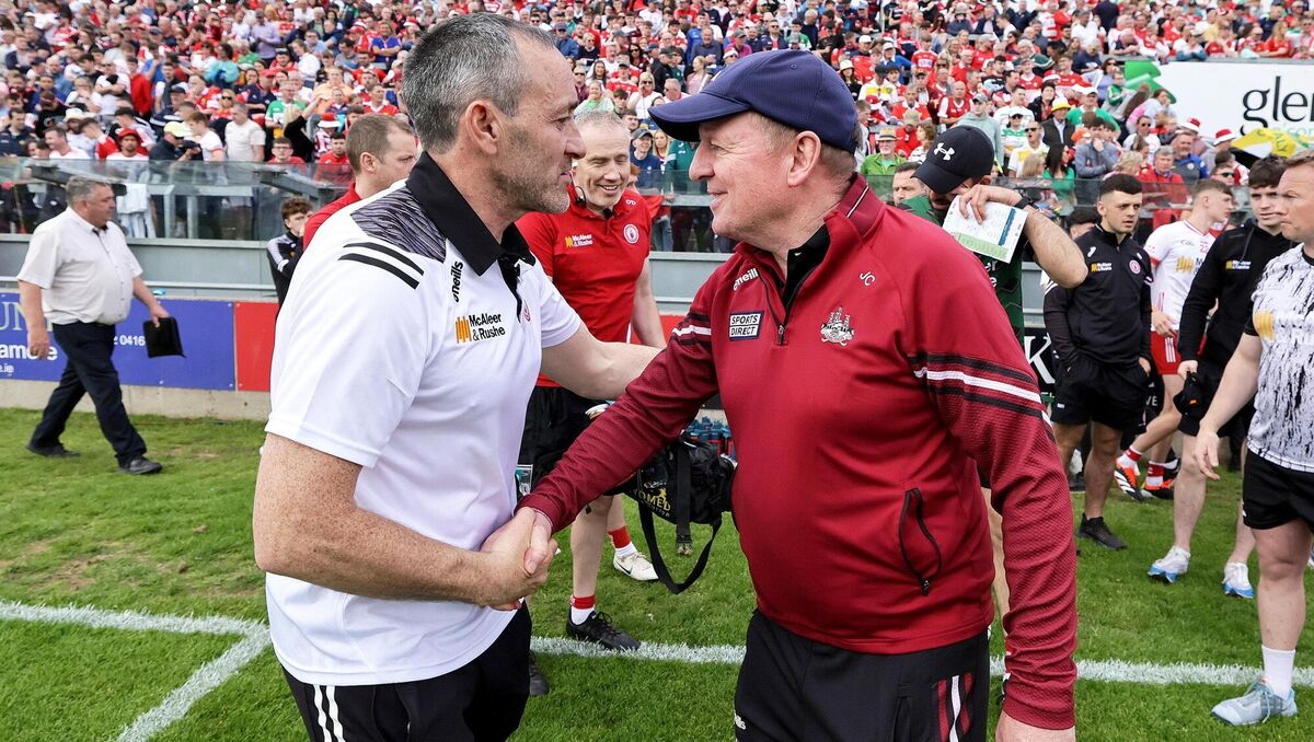 Tyrone joint-manager Brian Dooher shakes hands with Cork manager John Cleary after the game last Saturday. Picture: INPHO/Laszlo Geczo
