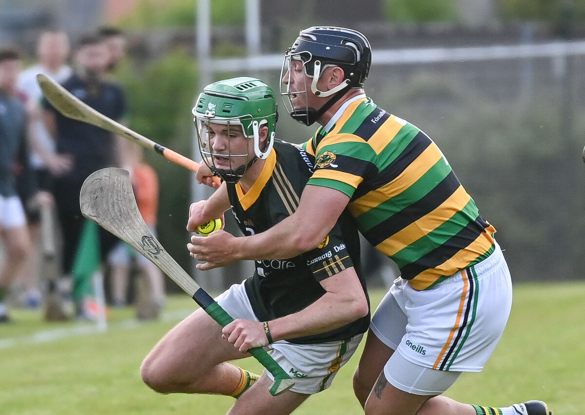  Blackrock's Peter Linehan is tackled by Glen Rovers' Dave Noonan, during their SHL clash at the Glen Field. Picture: David Keane.