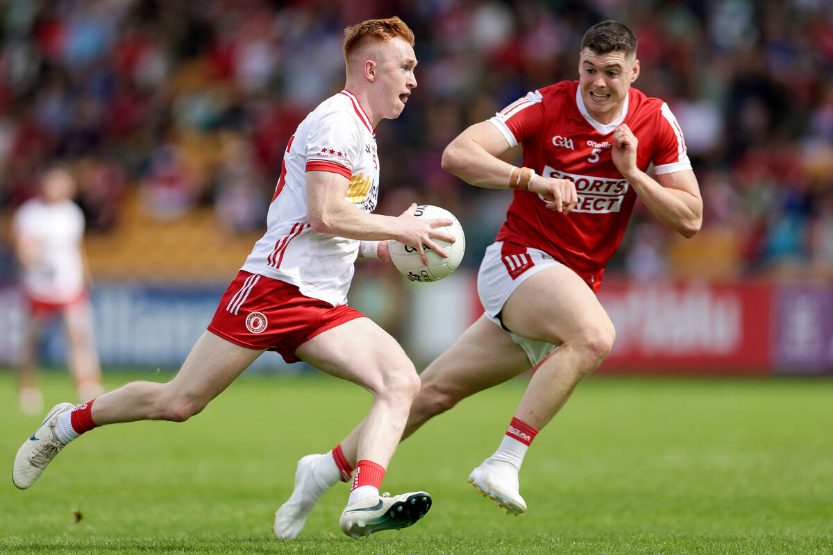 Tyrone's Seanie O'Donnell and Rory Maguire of Cork. Picture: INPHO/Laszlo Geczo