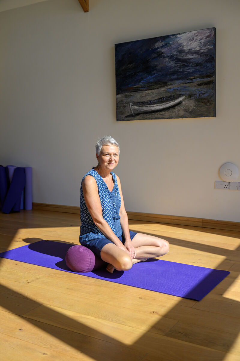 Sarah on her yoga mat.