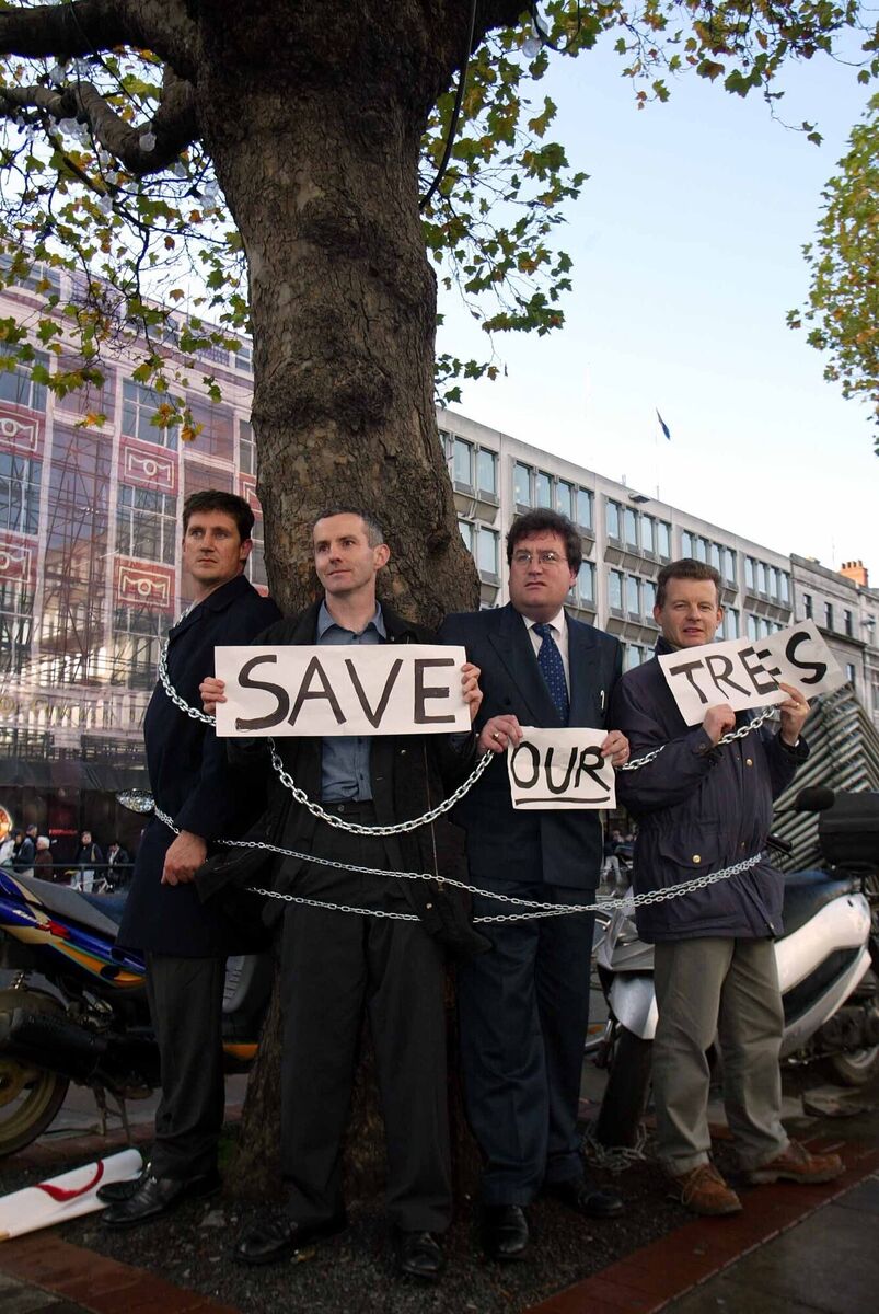 Pictured in 2002 are then Green Party TDs Ciaran Cuffe, Dan Boyle, then party leader Trevor Sargent and Eamon Ryan pictured in Dublin's O'Connell St where they chained themselves to highlight the council's proposed plan to chop down all the trees in the capital's main street. Picture: Billy Higgins Pictured in 2002 are then Green Party TDs Ciaran Cuffe, Dan Boyle, then party leader Trevor Sargent and Eamon Ryan pictured in Dublin's O'Connell St where they chained themselves to highlight the council's proposed plan to chop down all the trees in the capital's main street. Picture: Billy Higgins