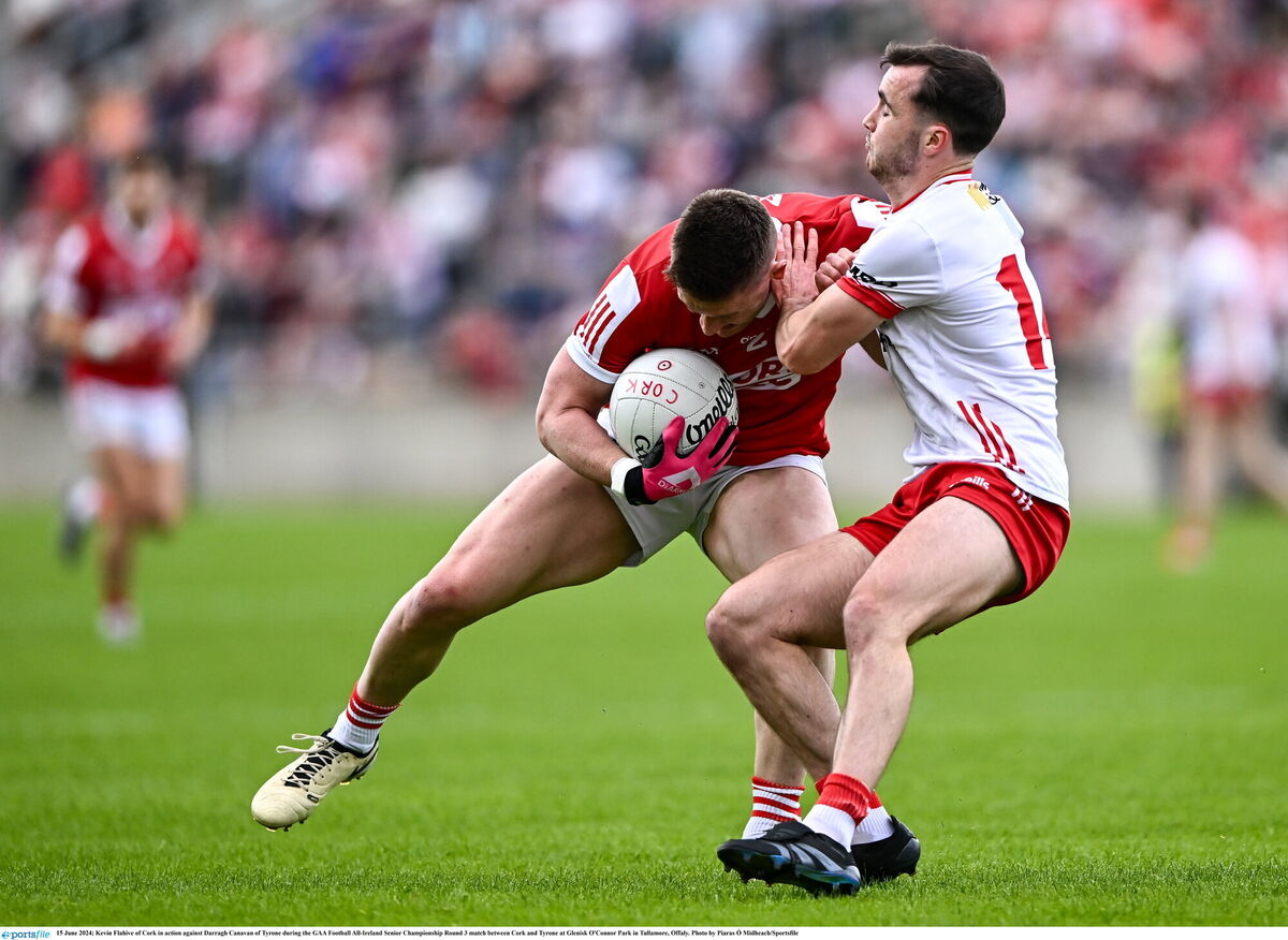 Cork's Kevin Flahive in action against Darragh Canavan of Tyrone. Picture: Piaras Ó Mídheach/Sportsfile