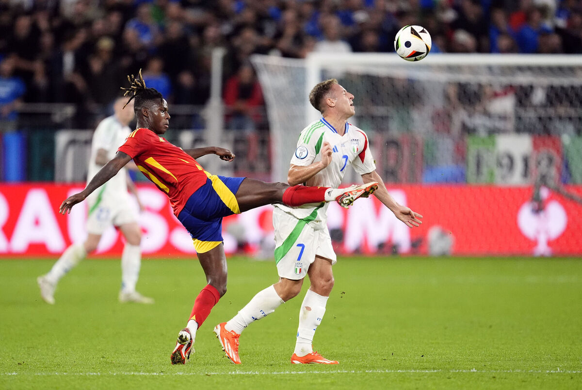 Spain's Nico Williams and Italy's Davide Frattesi (right) battle for the ball during their  Group B match at the Arena AufSchalke in Gelsenkirchen, Germany. Picture: Nick Potts/PA Wire