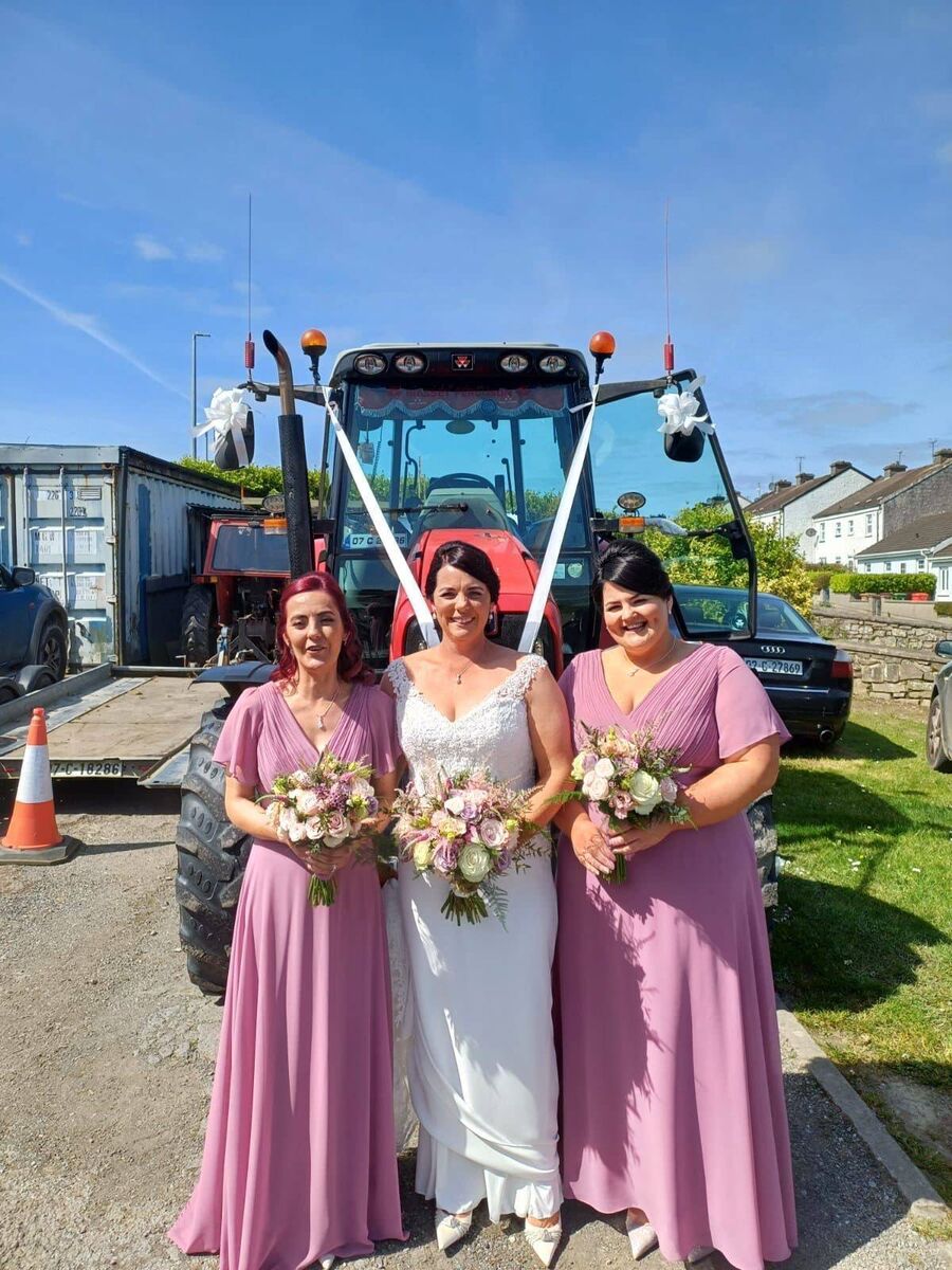 Orla with her bridesmaids. The transport she had planned broke down - but family came to the rescue and spruced up a tractor, so her dad could drive her to the church. Orla with her bridesmaids. The transport she had planned broke down - but family came to the rescue and spruced up a tractor, so her dad could drive her to the church.