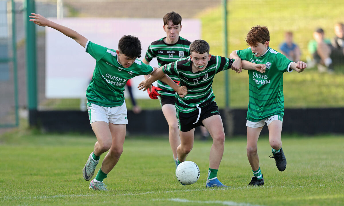  Jack O'Sullivan and Ruaidhri O'Connall, Ballincollig, battle with Sean O'Connell, Douglas. Picture: Jim Coughlan.