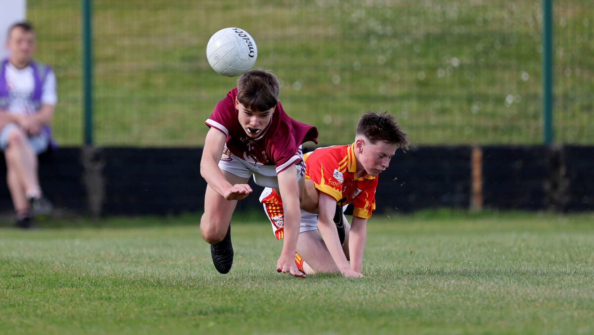 Darragh Crean, Éire Óg, tackles Dylan Murray, Bishopstown. Picture: Jim Coughlan.  Darragh Crean, Éire Óg, tackles Dylan Murray, Bishopstown. Picture: Jim Coughlan.