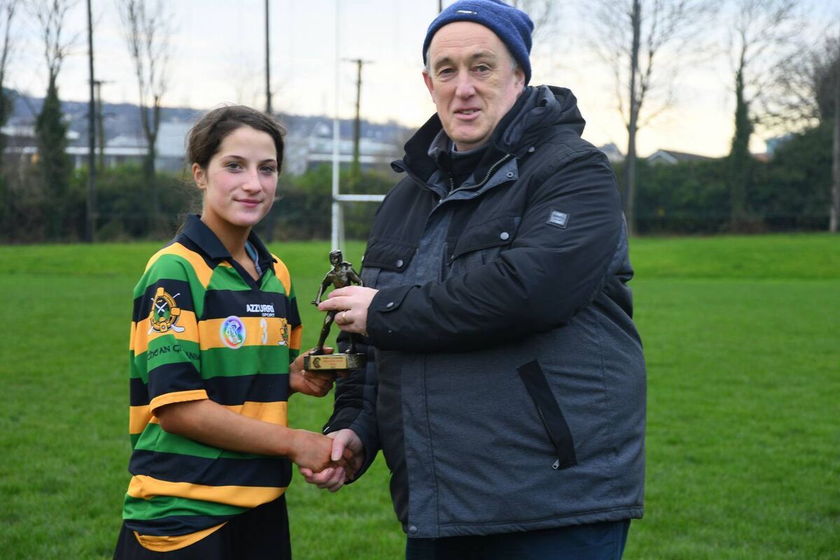 Sara Kate O'Meara, Glen Rovers, is presented with the U13 A Player of the Match by Donnacha Broderick, chairman of Seandún camogie. Sara Kate O'Meara, Glen Rovers, is presented with the U13 A Player of the Match by Donnacha Broderick, chairman of Seandún camogie.