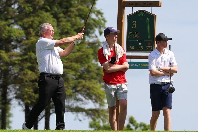 Castlemartyr's John O'Brien tees off the 3rd hole in Douglas, watched by Cork's Paddy Quill. Picture: James Doolan Castlemartyr's John O'Brien tees off the 3rd hole in Douglas, watched by Cork's Paddy Quill. Picture: James Doolan