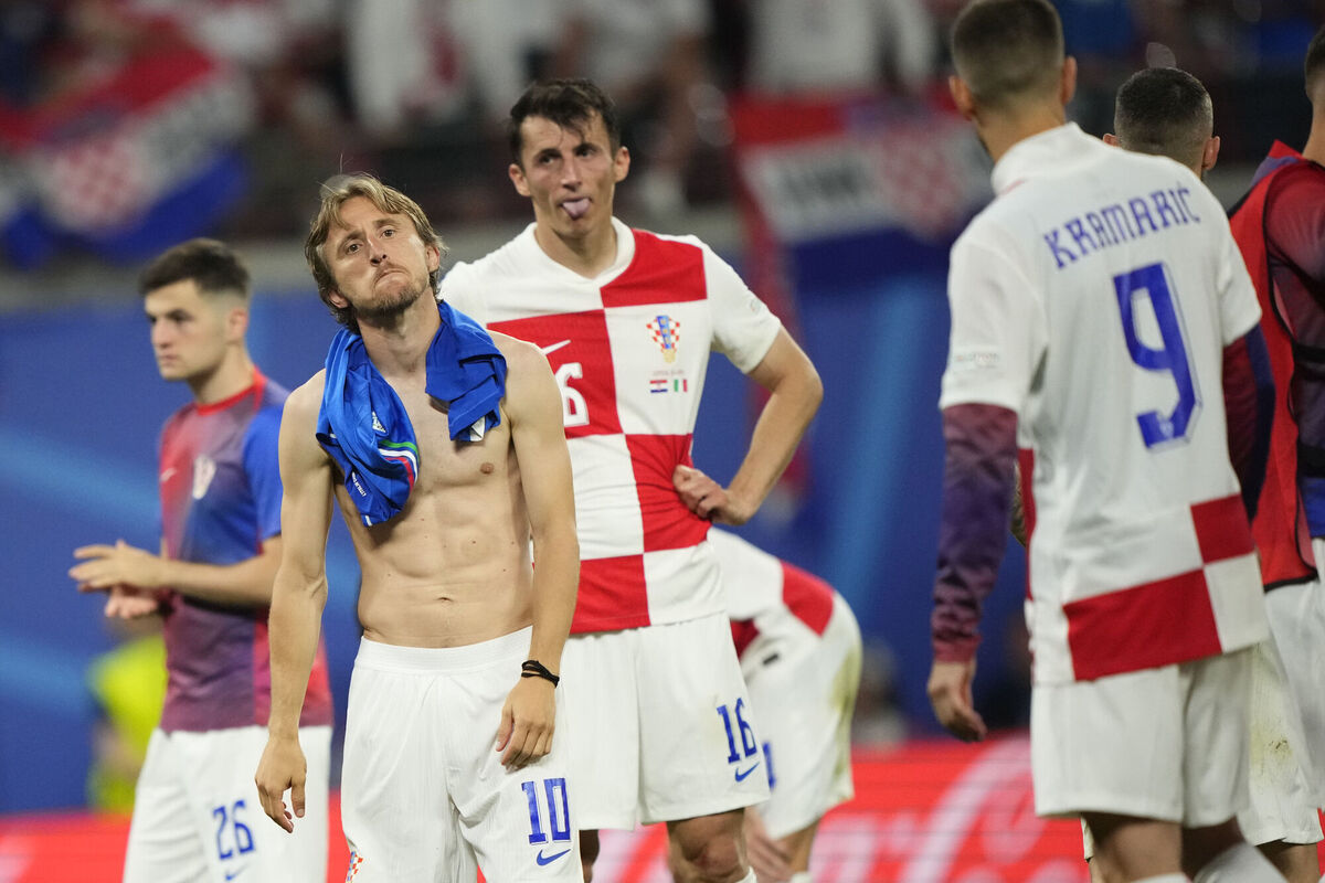 Croatia's Luka Modric reacts with his teammates at the end of a Group B match against Italy. Picture: AP Photo/Ebrahim Noroozi Croatia's Luka Modric reacts with his teammates at the end of a Group B match against Italy. Picture: AP Photo/Ebrahim Noroozi