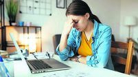 Unemployed woman expressing negative emotions during recession. Jobless woman looking vacancies online with no success