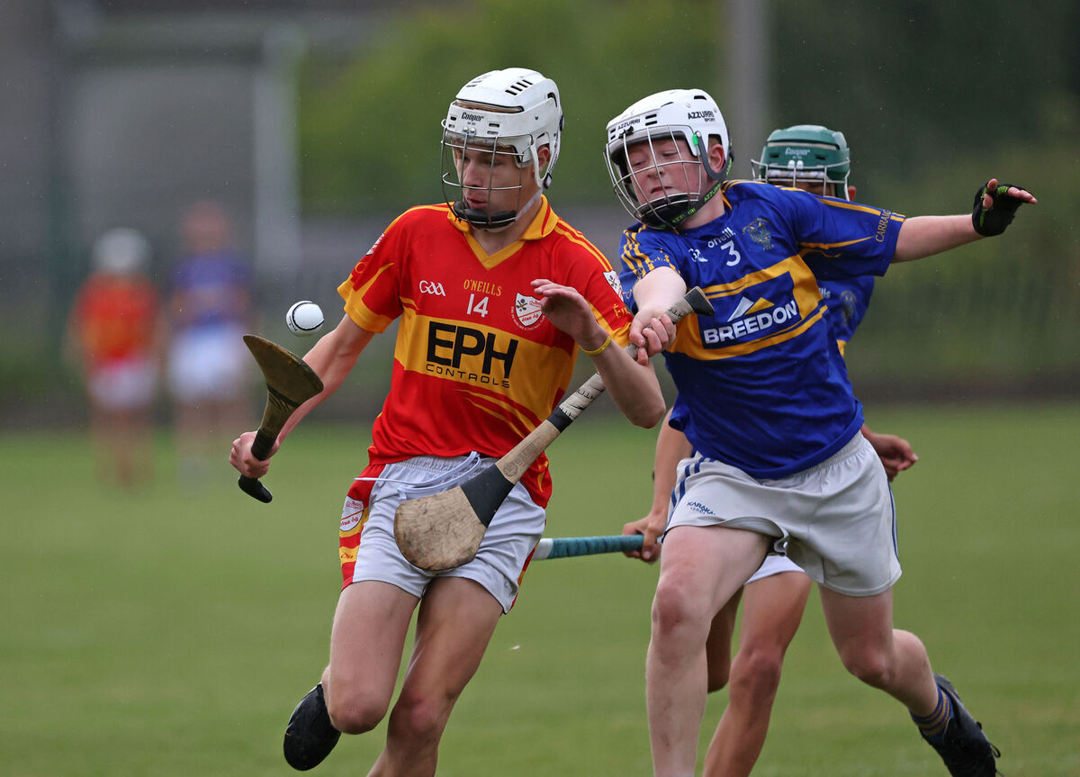 Sean Hogan, Éire Óg, battles with Jamie O'Riordan, Carrigtwohill. Picture: Jim Coughlan.  Sean Hogan, Éire Óg, battles with Jamie O'Riordan, Carrigtwohill. Picture: Jim Coughlan.