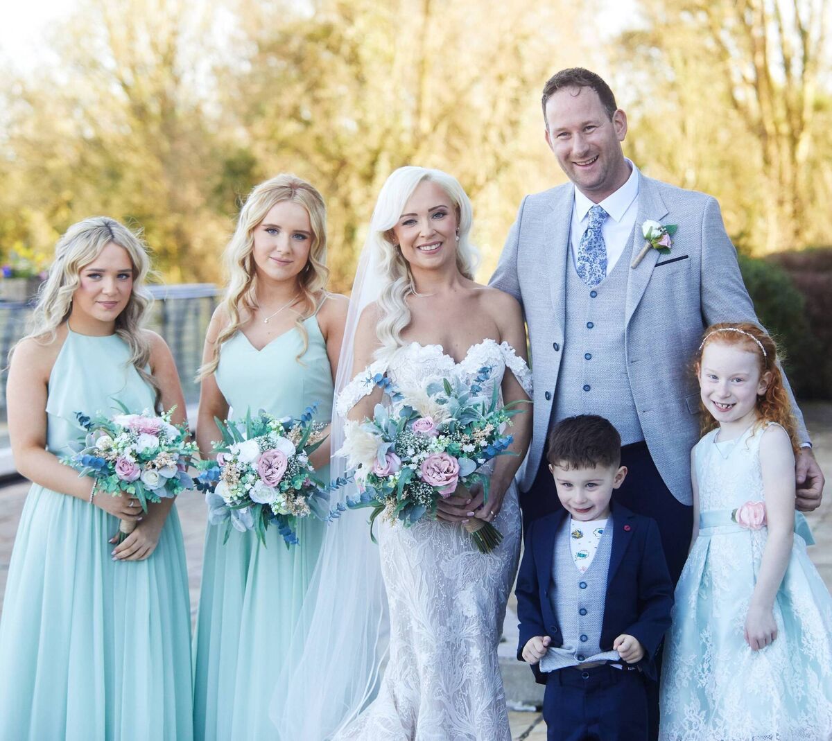 Emma and Eoin with their son Ethan and daughter Sienna (right) and Emma’s daughters Ella and Freya (left).
