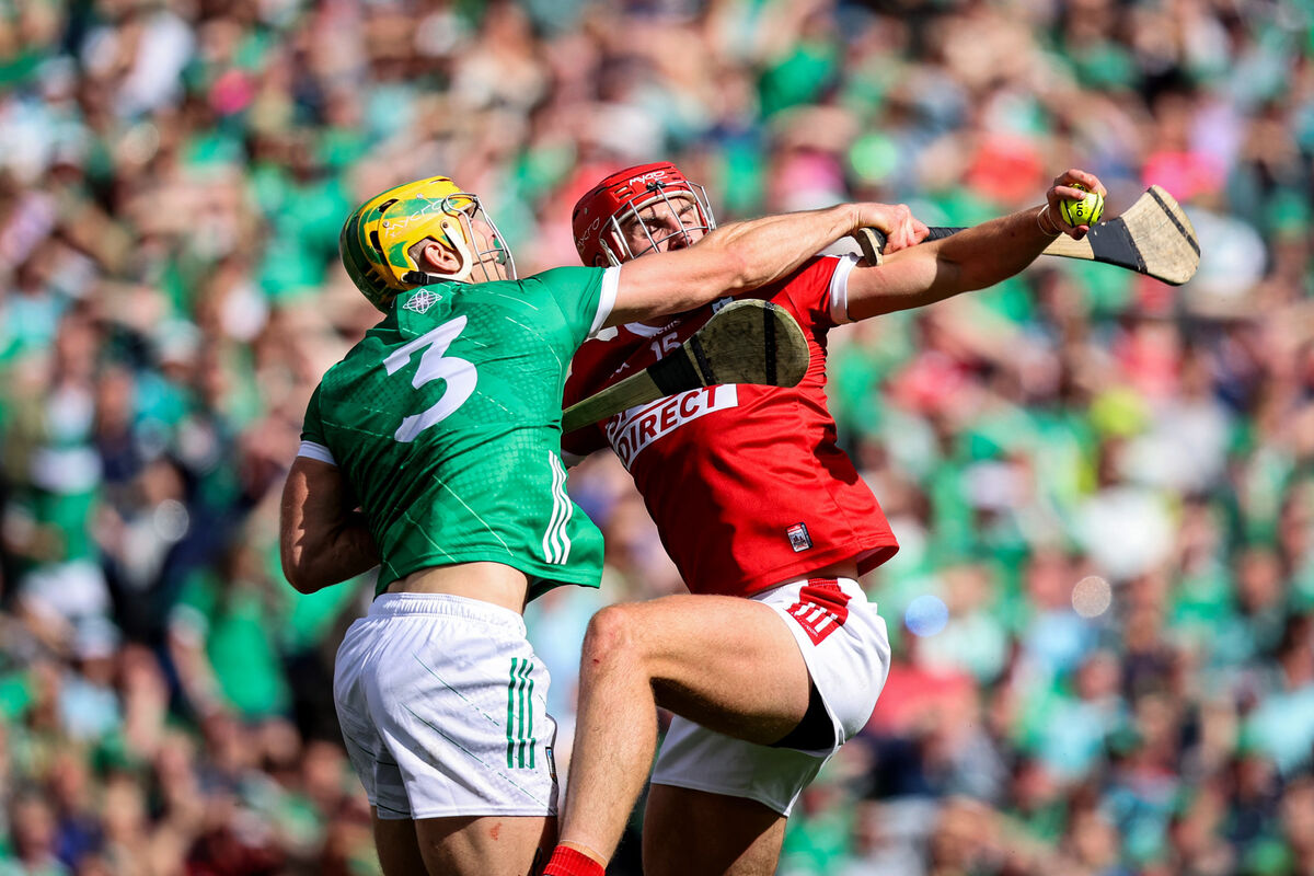 Limerick's Dan Morrissey and Brian Hayes of Cork