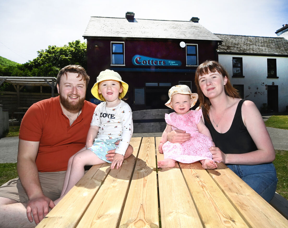 Roisin O'Connell of Cotter's Bar, Cape Clear Island, Co Cork with partner Cian McCann and children Saorlaith-Ré and Caoilfhionn, outside the public house. Picture: Larry Cummins Roisin O'Connell of Cotter's Bar, Cape Clear Island, Co Cork with partner Cian McCann and children Saorlaith-Ré and Caoilfhionn, outside the public house. Picture: Larry Cummins