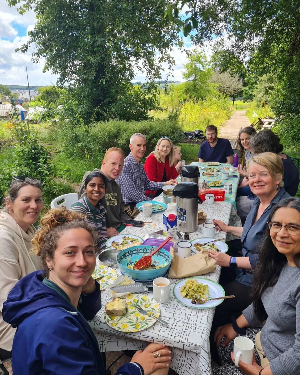 The Togher Community Garden team enjoying a well-earned lunch after a hard days work at the garden in last week.