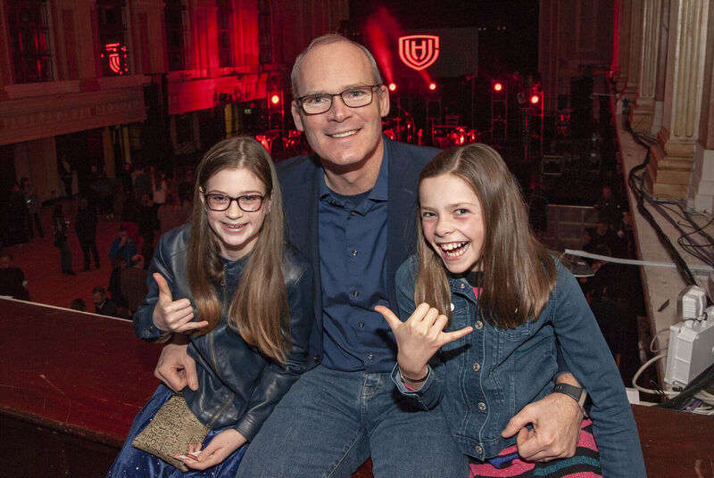 Simon Coveney TD, Tánaiste and Minister for Foreign Affairs and Trade with his daughter Beth (right) and her friend Chloe at a CUH Children's Unit fundraising concert #cuhheroes at Cork City Hall in 2019.Pic: Brian Lougheed