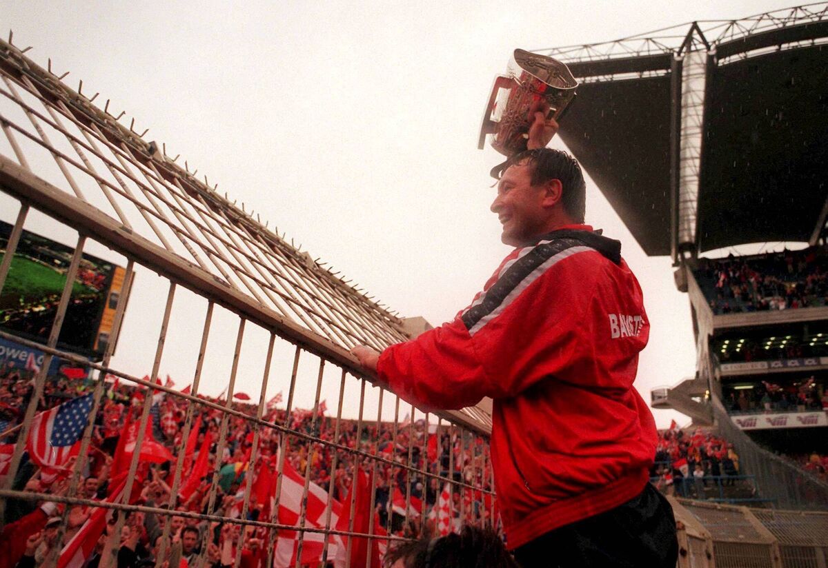 Cork manager Jimmy Barry Murphy shows off the Liam MacCarthy Cup to Cork supporters on Hill 16 in 1999. Picture: David Maher/Sportsfile Cork manager Jimmy Barry Murphy shows off the Liam MacCarthy Cup to Cork supporters on Hill 16 in 1999. Picture: David Maher/Sportsfile