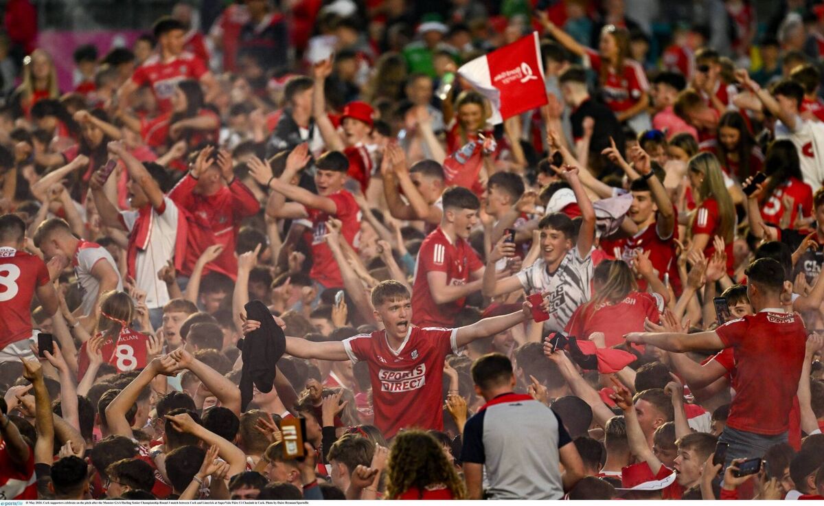 Cork supporters celebrate on the pitch after the win over Limerick in May. Picture: Daire Brennan/Sportsfile