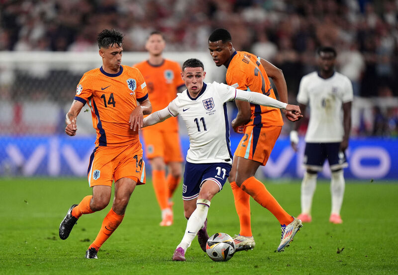 Netherlands' Tijjani Reijnders (left) and England's Phil Foden battle for the ball during the UEFA Euro 2024, semi-final match at the BVB Stadion Dortmund in Dortmund, Germany. Picture: Bradley Collyer/PA Wire.