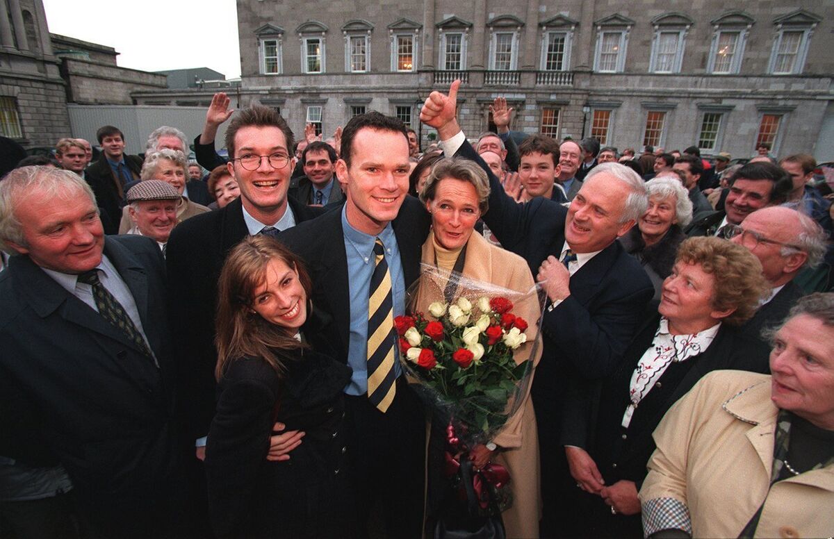 Simon Coveney pictured with his supporters and (now wife) Ruth Furney, mother Pauline, brother Patrick and then Fine Gael leader John Bruton as he entered the Dáil in 1998. Photo: Maxwell Dublin 