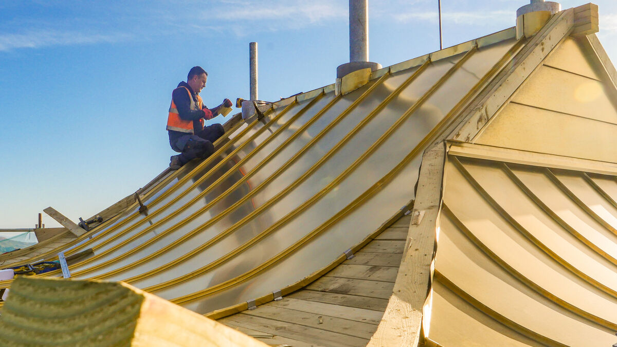 Olan Wycherly of of Wychbro Coppersmiths during the construction of the copper roofs at Dzogchen Beara in January 2022. Picture; Noel Sweeney Olan Wycherly of of Wychbro Coppersmiths during the construction of the copper roofs at Dzogchen Beara in January 2022. Picture; Noel Sweeney