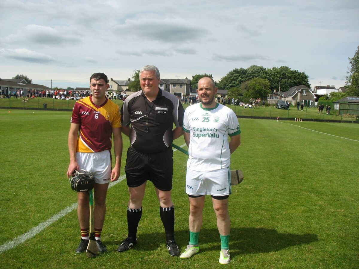 The captains and the referee (L-R) Mark Callanan (Whitechurch), Referee Pat Lyons, Paul Cullinane (St Vincent's).   The captains and the referee (L-R) Mark Callanan (Whitechurch), Referee Pat Lyons, Paul Cullinane (St Vincent's).