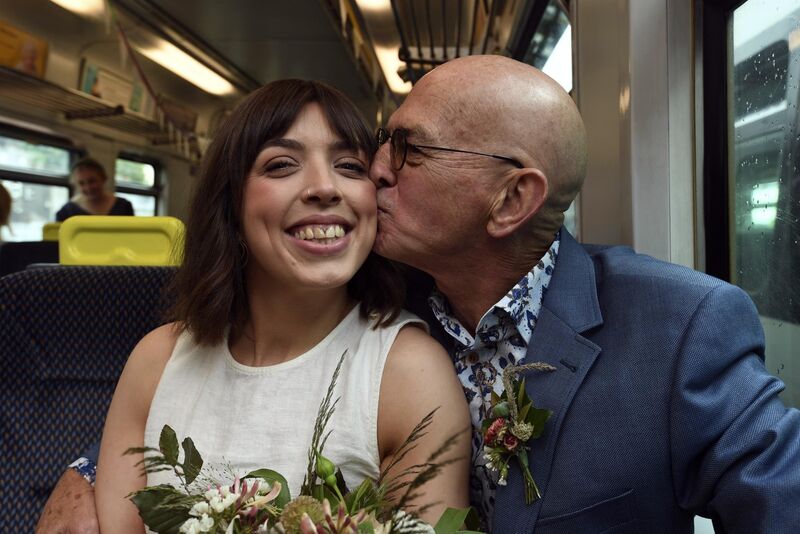 Bride, Lucy Kelly with dad Joe Kelly kissing his daughter as they celebrated their wedding on Sunday Bride, Lucy Kelly with dad Joe Kelly kissing his daughter as they celebrated their wedding on Sunday