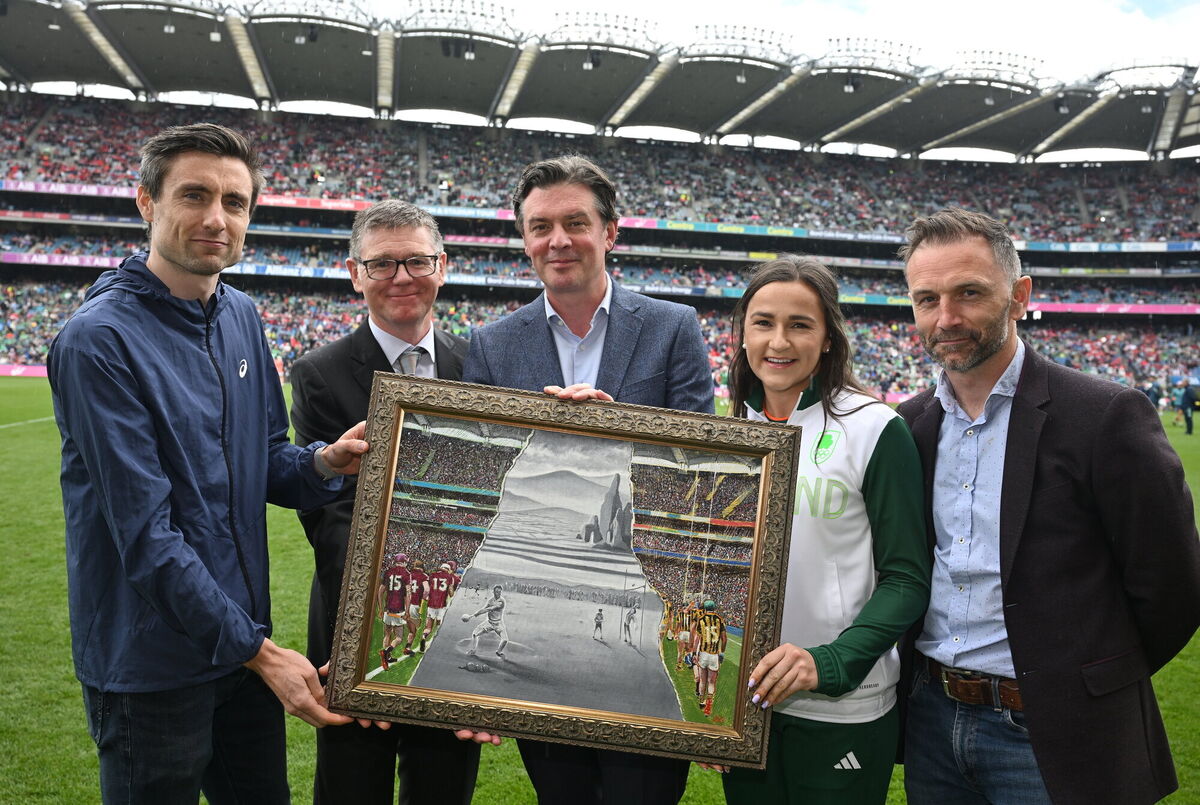 Mark English, Ard Stiúrthóir of the GAA Tom Ryan, OFI CEO Peter Sherrard, athlete Phil Healy and artist David Sweeney at the GAA presentation to the OFI, celebrating the centenary of Team Ireland at the Olympics, at Croke Park. Picture: Ray McManus/Sportsfile