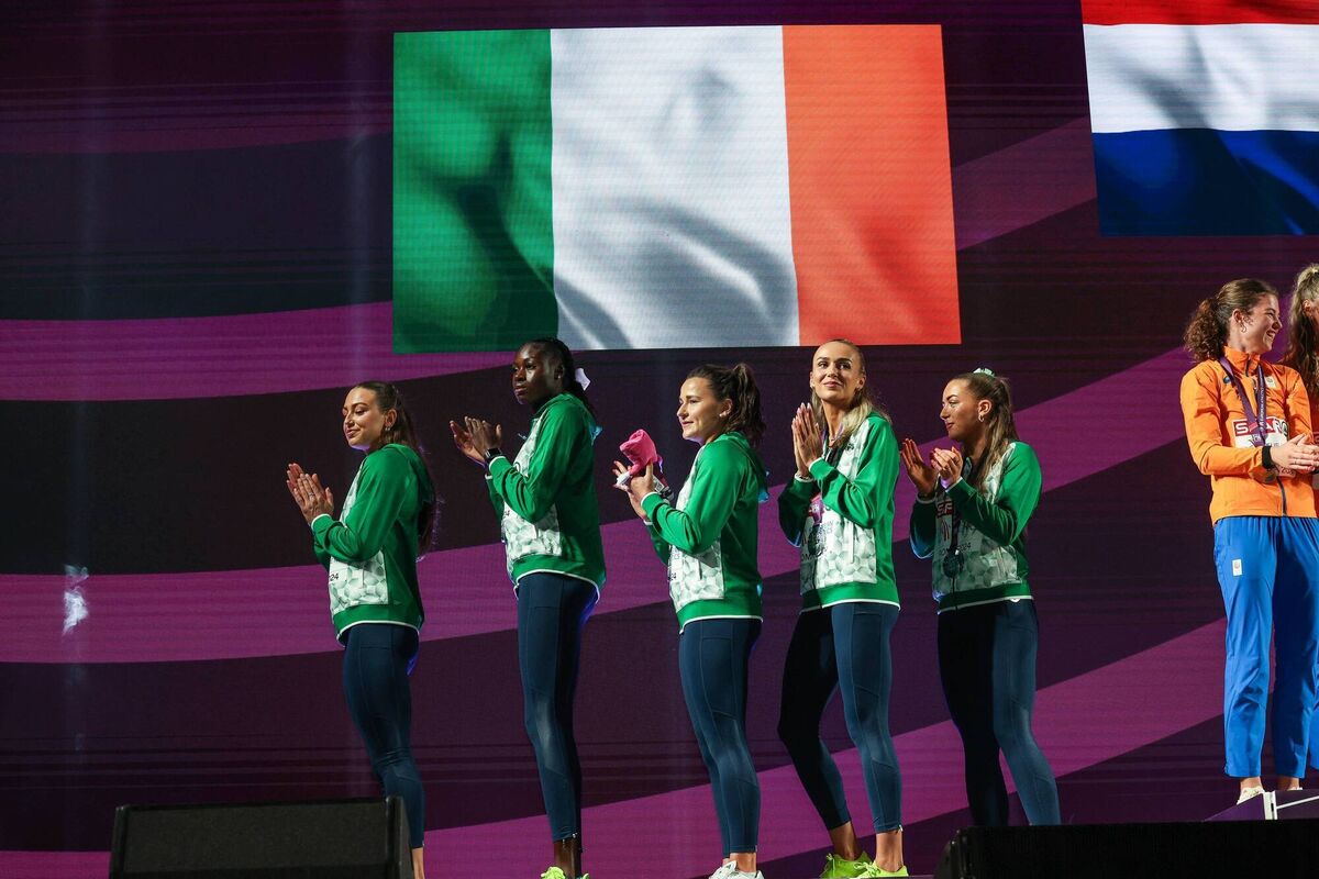 Sophie Becker, Rhasidat Adeleke, Phil Healy, Sharlene Mawdsley and Lauren Cadden celebrate with their silver medals. Photo: Morgan Treacy/Inpho