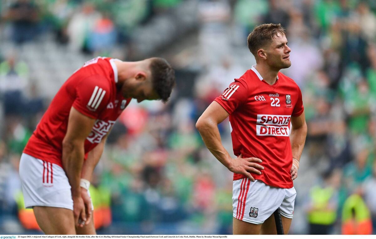 A dejected Alan Cadogan of Cork, right, alongside his brother Eoin, after Cork's humiliating defeat to Limerick in the All-Ireland SHC final in 2021. Picture: Brendan Moran/Sportsfile