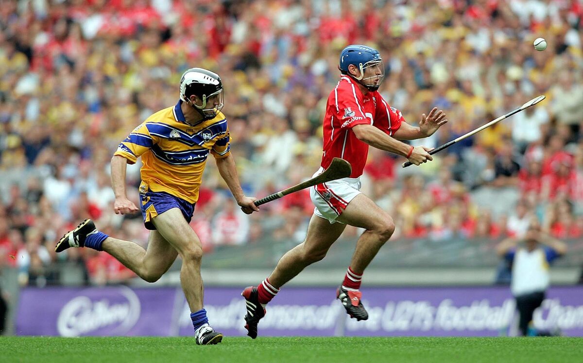 Tom Kenny of Cork tries to get away from Clare's Gerry Quinn. Picture: Inpho/Tom Honan