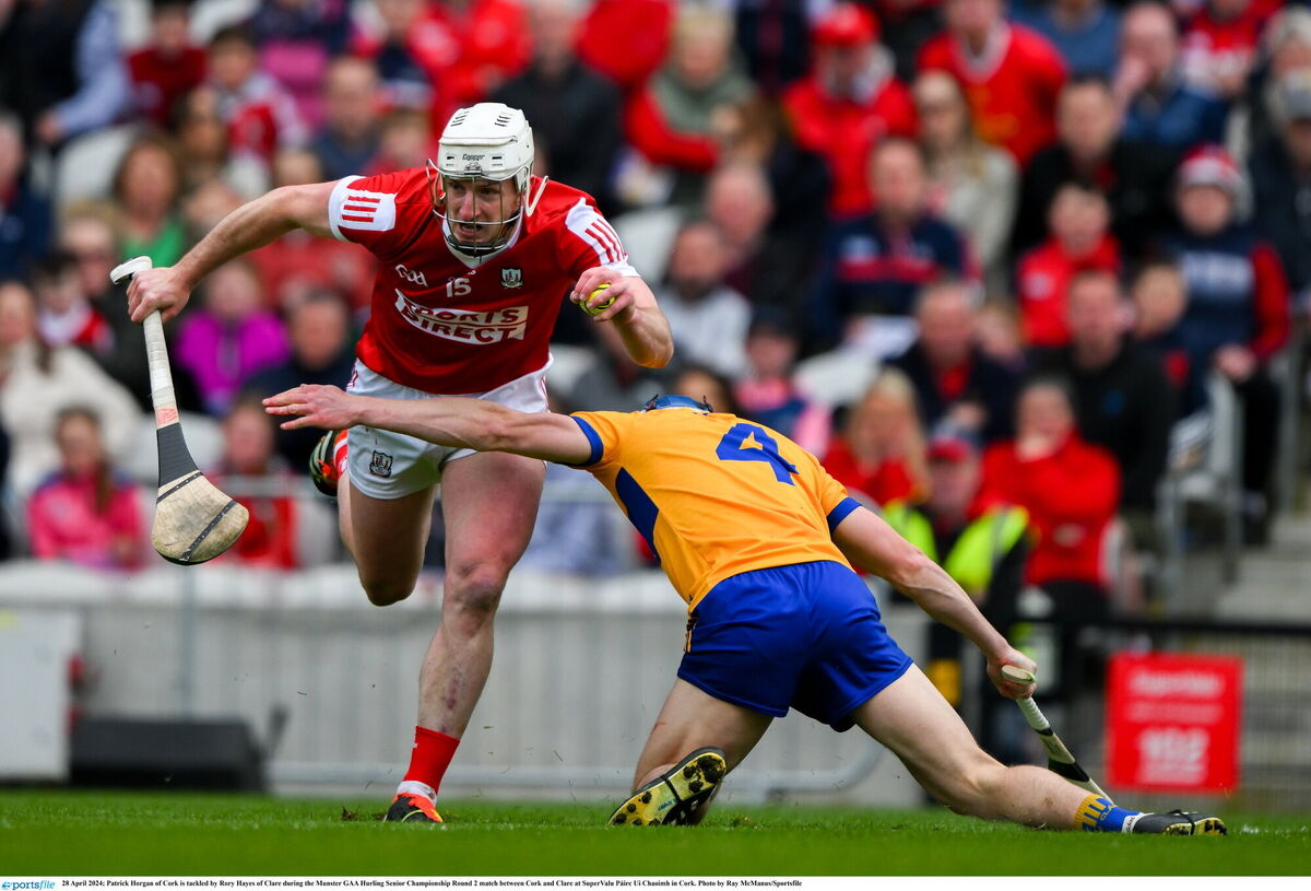 Cork's Patrick Horgan is tackled by Rory Hayes of Clare during the Munster SHC game at SuperValu Páirc Uí Chaoimh in April. Picture: Ray McManus/Sportsfile