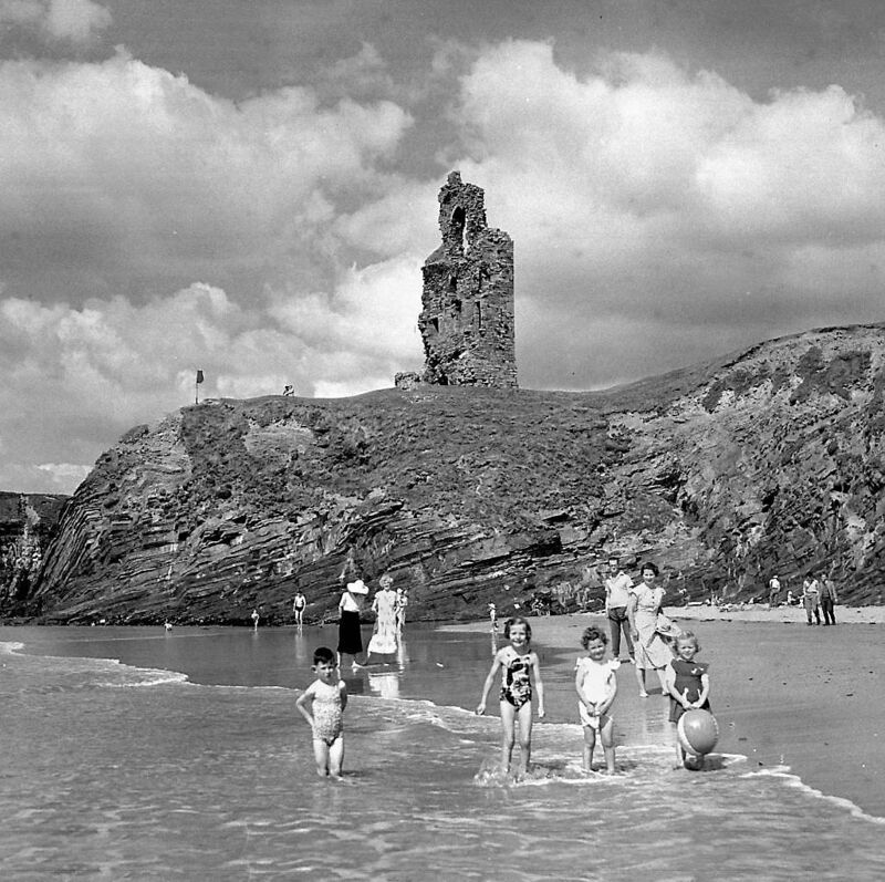 Children playing on Ballybunion Strand, Co. Kerry, in the summer of 1953. Throwback Thursday reader Stephen Twohig recalls holidays here, saying “It was our Disney!”