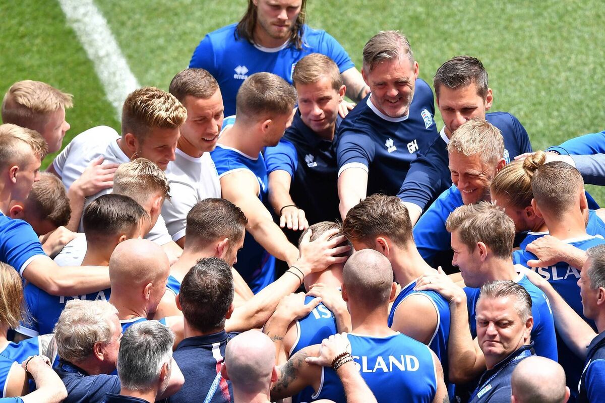 Iceland's coach Heimir Hallgrimsson (R) shares a laugh with his players during a training session, on June 25, 2018 at Rostov arena, on the eve of the team's third match as part of the Russia 2018 World Cup football tournament. Picture:  JOE KLAMAR / AFP/Getty Images)
