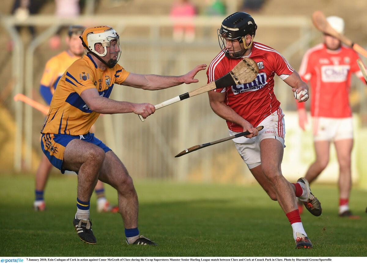 7 January 2018; Eoin Cadogan of Cork in action against Conor McGrath of Clare during the Co-op Superstores Munster Senior Hurling League match between Clare and Cork at Cusack Park in Clare. Photo by Diarmuid Greene/Sportsfile 7 January 2018; Eoin Cadogan of Cork in action against Conor McGrath of Clare during the Co-op Superstores Munster Senior Hurling League match between Clare and Cork at Cusack Park in Clare. Photo by Diarmuid Greene/Sportsfile