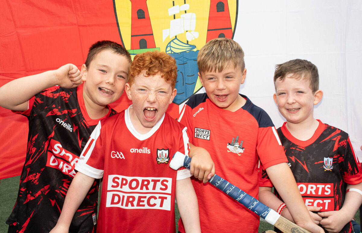 Nathan Murphy, Oisin Dowd, Kael Shaw and Luke Broderick shouting 'Up the Rebels!' at St Vincent's GAA Cul Camp in support of the Cork senior hurling team in the All Ireland this weekend. Pictuire: Howard Crowdy