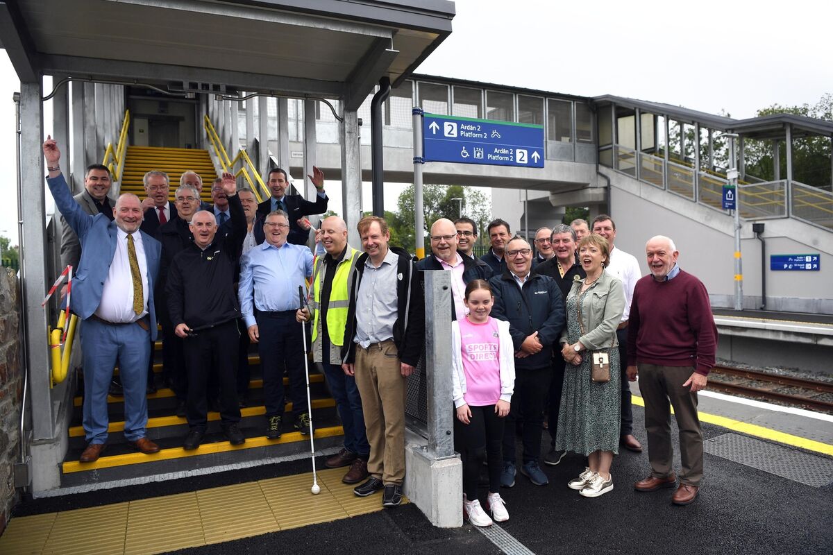 Colin O'Sullivan, station master, Banteer cuts the tape to officially open the new accessibility facilities at Banteer Railway Station in North Cork on Thursday. Also Included in the photo are, Barry O'Donnell, 'Voice of Vision Impairment’, Kevin Quaid, chairperson of the European Working Group of People with Dementia, Colin Grimes, programme manager for Iarnród Éireann, Ronan Murphy, Irish Rail, Ciaran Delaney, Irish Rail, Michael Moynihan TD, Cllr Liam Madden, Cllr Ian Doyle, Cllr John Paul O'Shea, Bernie O’Connor and Rory O’Donnell. Photo: Don MacMonagle. Colin O'Sullivan, station master, Banteer cuts the tape to officially open the new accessibility facilities at Banteer Railway Station in North Cork on Thursday. Also Included in the photo are, Barry O'Donnell, 'Voice of Vision Impairment’, Kevin Quaid, chairperson of the European Working Group of People with Dementia, Colin Grimes, programme manager for Iarnród Éireann, Ronan Murphy, Irish Rail, Ciaran Delaney, Irish Rail, Michael Moynihan TD, Cllr Liam Madden, Cllr Ian Doyle, Cllr John Paul O'Shea, Bernie O’Connor and Rory O’Donnell. Photo: Don MacMonagle.