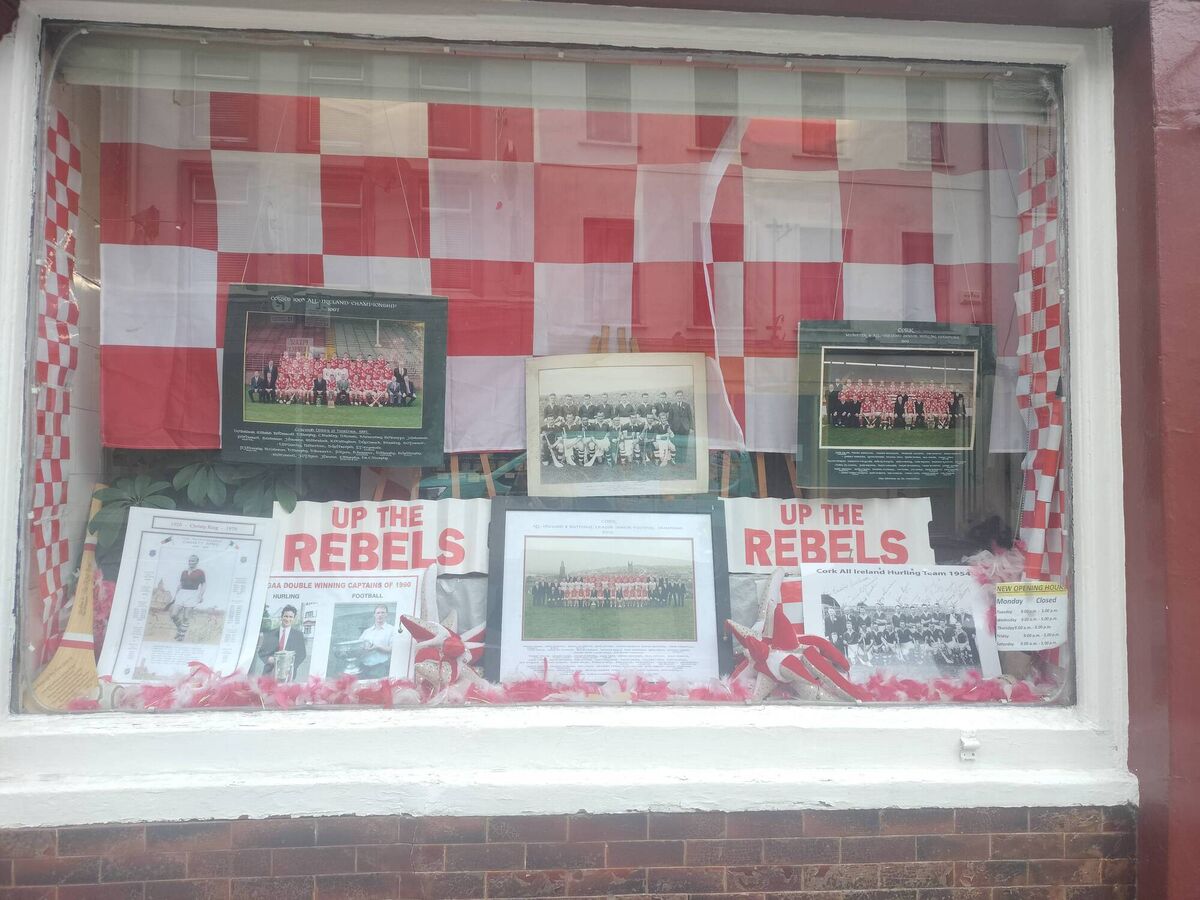 Nolans' Butchers on Shandon Street has decorated its window with bunting and displayed photographs of All-Ireland winning teams from down through the years ahead of the hurling final at Croke Park on Sunday. Photo credit: Sandra Morrissey.