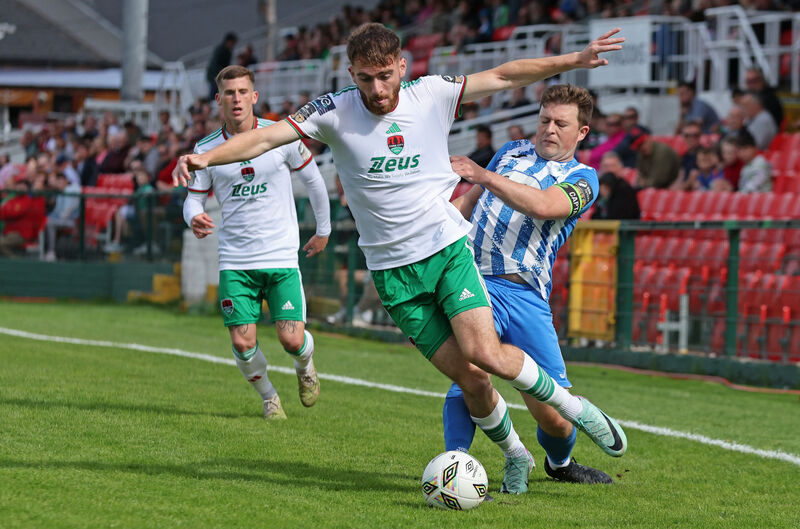 Cork City's Conor Drinan is tackled by Tony McNamee, Finn Harps. Picture: Jim Coughlan.