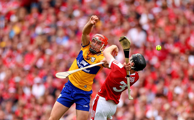 Cork's Eoin Downey battles in the air against Petter Duggan of Clare. Picture: Inpho/James Crombie