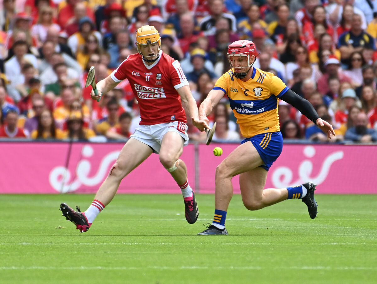 Shane Barrett and Clare's John Conlon tussle for the sliotar. Picture: Eddie O'Hare