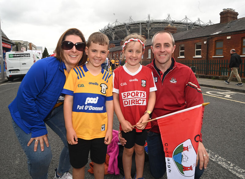Family divided......Parents Richard and Mairead with children Micheal and Roisin, from Ballineen. Cork and Clare Fans before the game on Sunday. Picture: Larry Cummins. Family divided......Parents Richard and Mairead with children Micheal and Roisin, from Ballineen. Cork and Clare Fans before the game on Sunday. Picture: Larry Cummins.