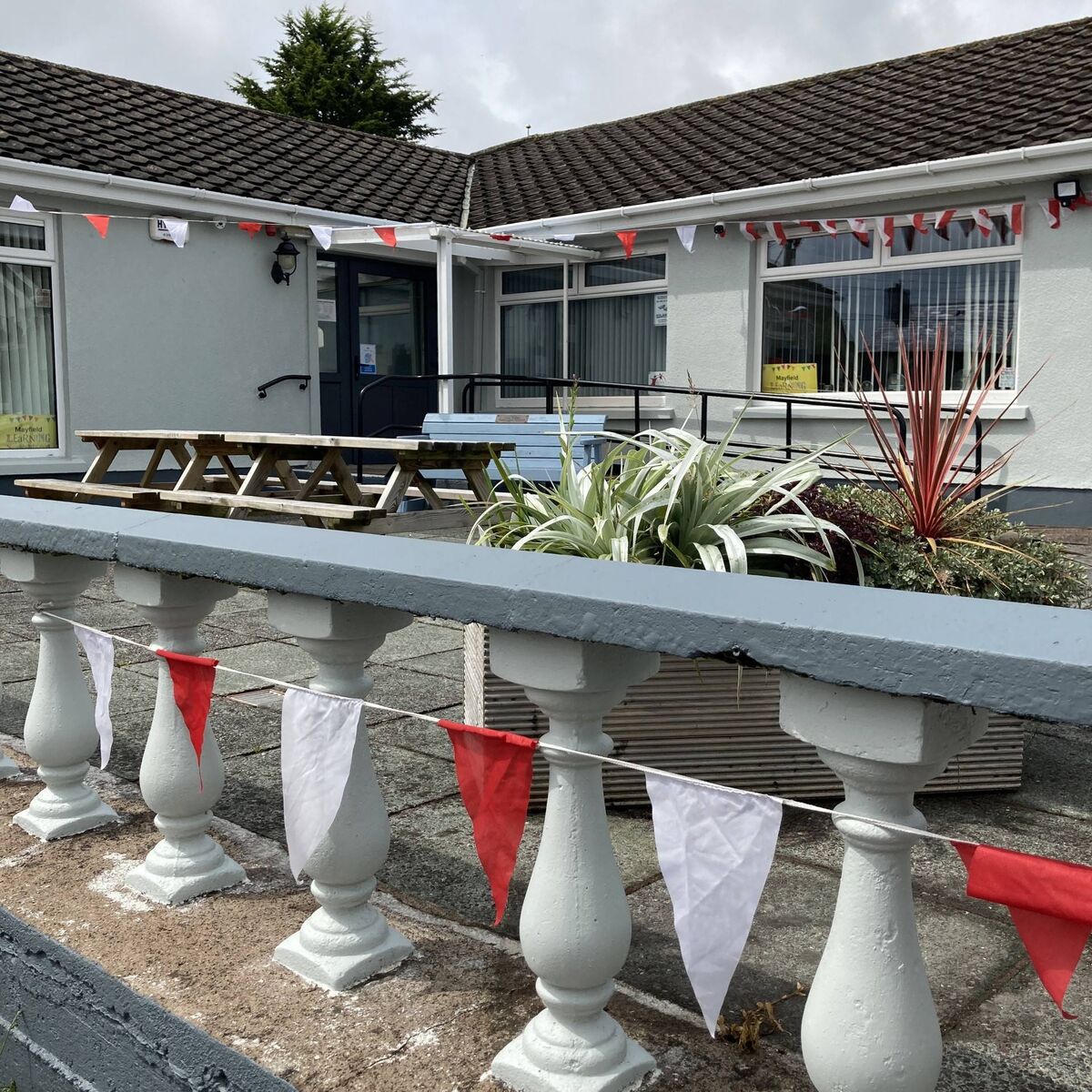 Mayfield CDP centre, decorated with Cork flags to support the hurlers.