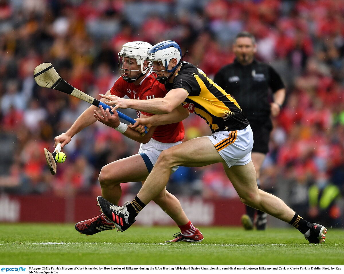 Patrick Horgan of Cork is tackled by Huw Lawlor of Kilkenny in 2021. Picture: Ray McManus/Sportsfile